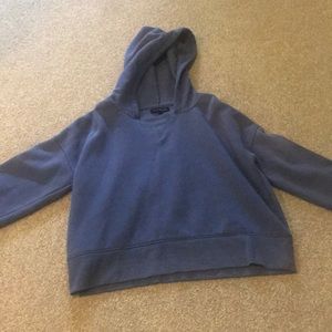 cropped purple sweatshirt